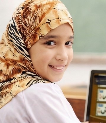 Girl with hijab learning